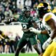 Michigan State football quarterback Aidan Chiles throws a pass