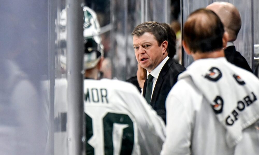 Michigan State hockey coach Adam Nightingale talks to his team.