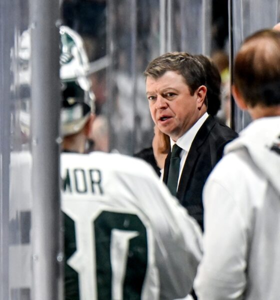 Michigan State hockey coach Adam Nightingale talks to his team.