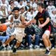 Michigan State basketball senior Jaden Akins drives the baseline.