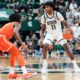 Michigan State basketball star Jase Richardson dribbles against Bowling Green