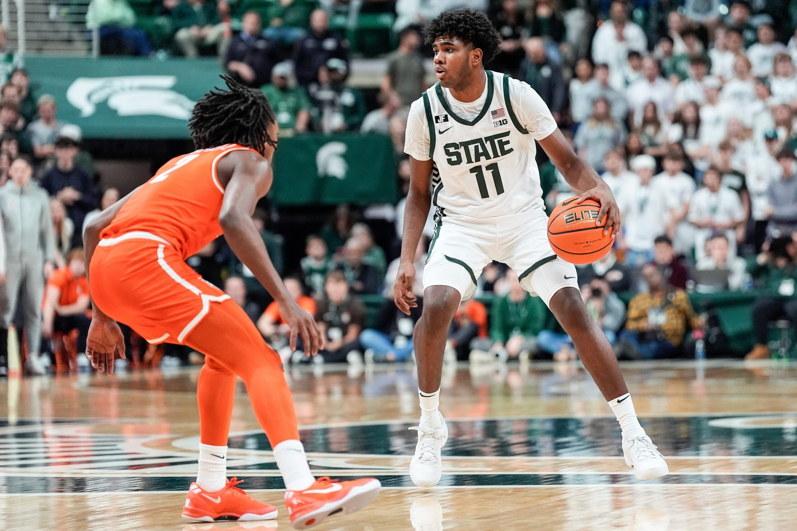 Michigan State basketball star Jase Richardson dribbles against Bowling Green