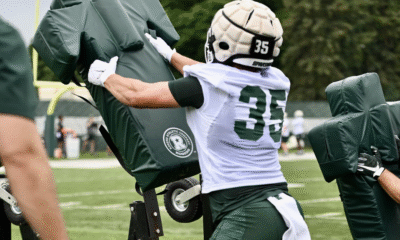 Michigan State football captain Sam Edwards goes through fall drills.