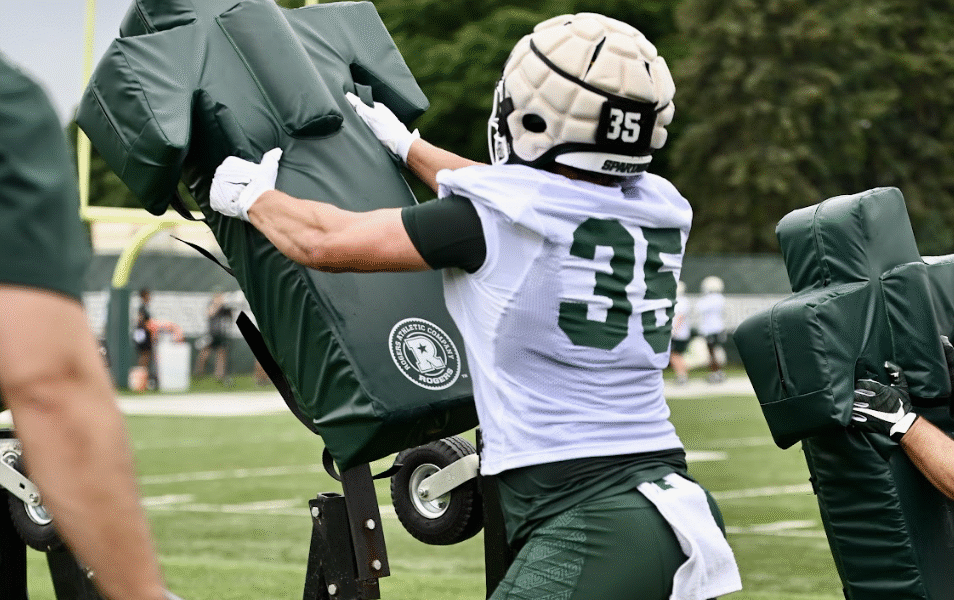 Michigan State football captain Sam Edwards goes through fall drills.