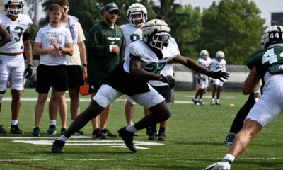 Michigan State football DL Tyler Gillison going through drills.