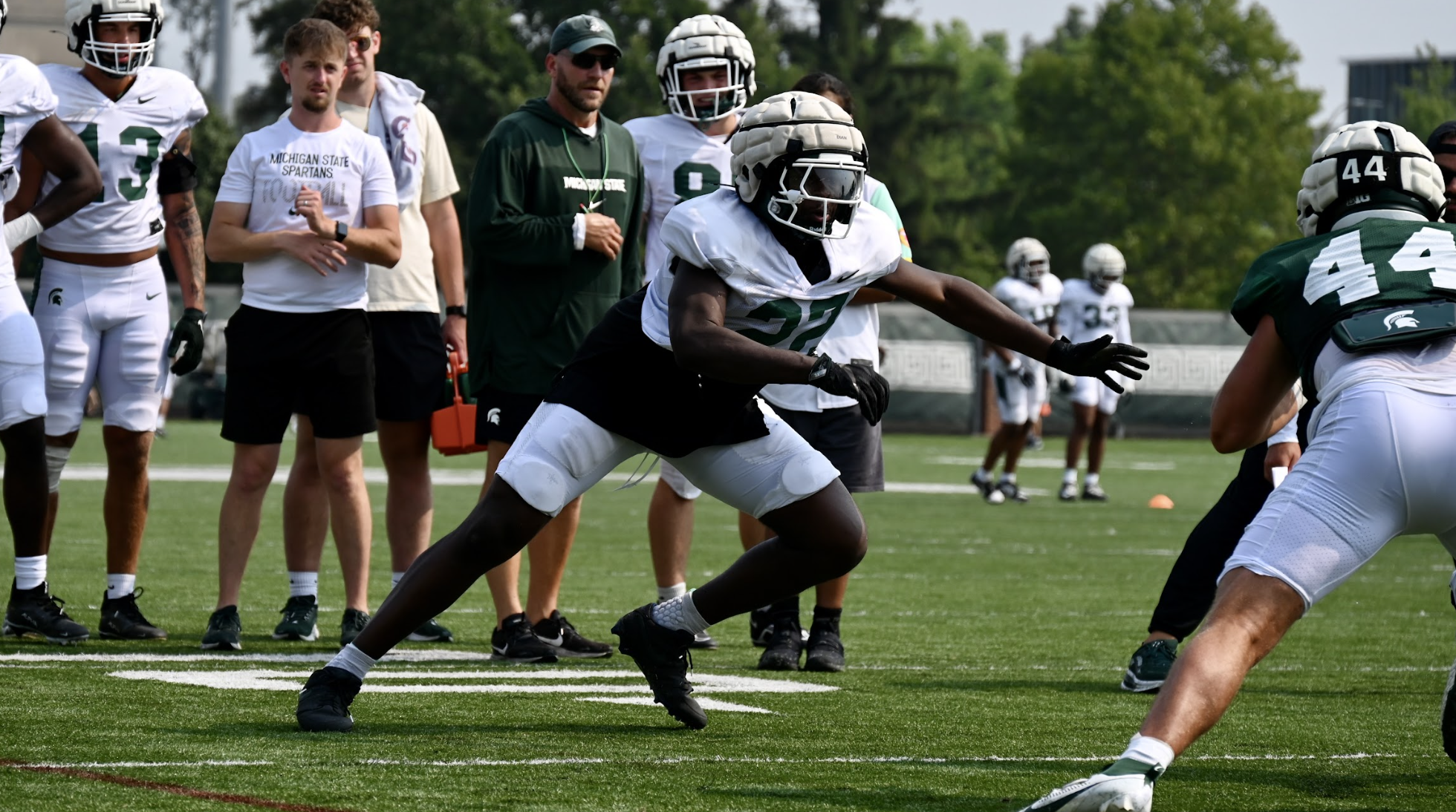 Michigan State football DL Tyler Gillison going through drills.