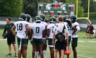 Michigan State football huddles up at practice