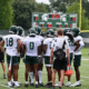 Michigan State football huddles up at practice