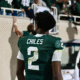 Michigan State football QB1 Aidan Chiles walks off the field.